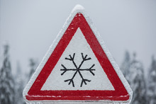 Traffic Sign For Icy Road Covered With Ice
