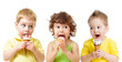 © Andrey Kuzmin - funny kids boys and girl eating ice cream cone isolated on white