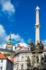 Wall Mural - The Holy Trinity column and St. Vitus cathedral in Prague