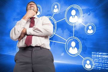 Poster - Composite image of thoughtful businessman holding pen to chin