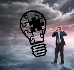 Poster - Composite image of stressed businessman with hands on head