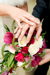 Wall Mural - Bouquet and hands with rings