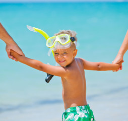 Wall Mural - Happy boy on beach