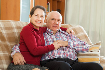 Wall Mural - mature couple in home interior