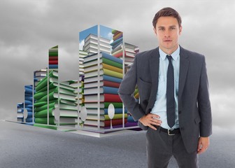 Poster - Composite image of serious businessman standing with hand on hip