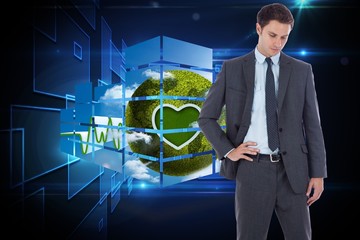 Poster - Composite image of serious businessman with hand on hip
