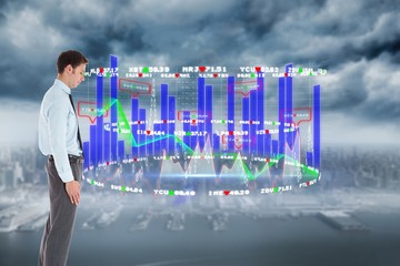 Poster - Composite image of serious businessman standing with hand in