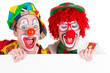 canvas print picture - clowns schauen begeistert auf schild