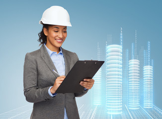 Poster - businesswoman in white helmet with clipboard