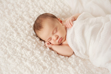 portrait of a sleeping newborn baby