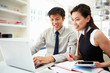© Monkey Business - Asian Couple Working From Home Looking At Personal Finances