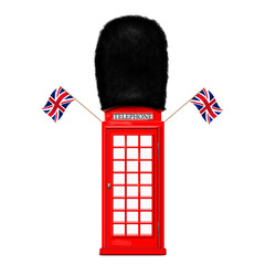 Wall Mural - Red telephone booth in the guards cap and with British flags