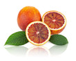 Blood oranges with cut and green leaves isolated on white backgr