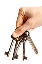 Hand Holding Old Rusty Keys