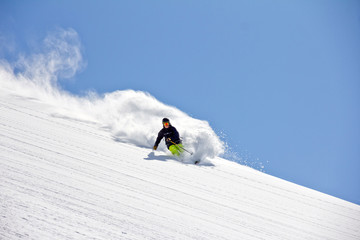 Wall Mural - Skier in deep powder, extreme freeride