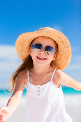 Wall Mural - Adorable little girl at beach