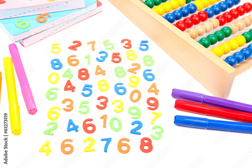 Colorful numbers, abacus, books and markers, isolated on white