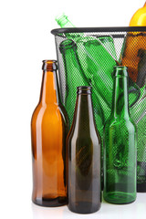 Poster - Glass bottles in recycling bin isolated on white