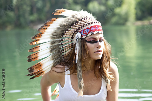 Fototapeta na wymiar Woman in costume of American Indian