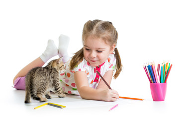 Fototapete - child drawing with pencils and playing with kitten