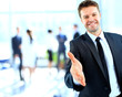 © ASDF - Businessman offering a handshake