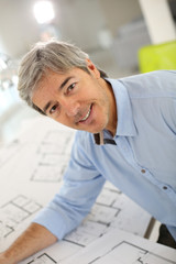 Wall Mural - Portrait of smiling architect working in office