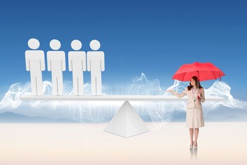 Wall Mural - Composite image of attractive businesswoman holding red umbrella