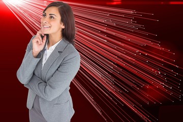 Poster - Composite image of smiling thoughtful businesswoman