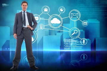 Poster - Composite image of serious businessman with hand on hip