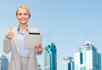 Poster - smiling woman with tablet pc showing thumbs up