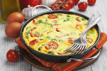 Canvas Print - Omelet with vegetables and cheese. Frittata