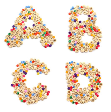 The alphabet from multi-colored buttons