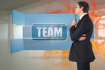 Poster - Composite image of thinking businessman holding pen