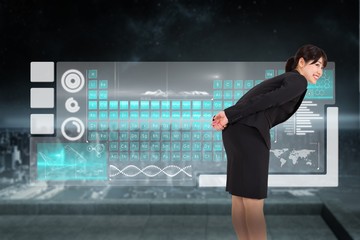 Poster - Composite image of smiling businesswoman bending