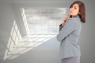 Poster - Composite image of worried businesswoman