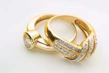 Jewelry Gold Rings With Diamond On White Background Close Up