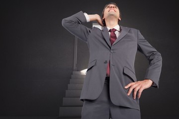 Poster - Composite image of thinking businessman scratching head