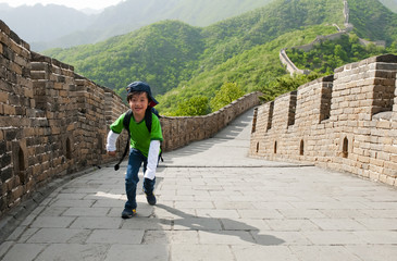 Young boy outdoor activity: hiking the Great Wall