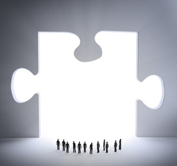 Wall Mural - tiny people and a jigsaw puzzle piece
