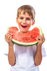 Boy is eating a watermelon