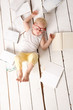© cheese78 - Boy on white painted floor