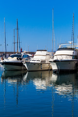 Wall Mural - White yachts on an anchor in harbor