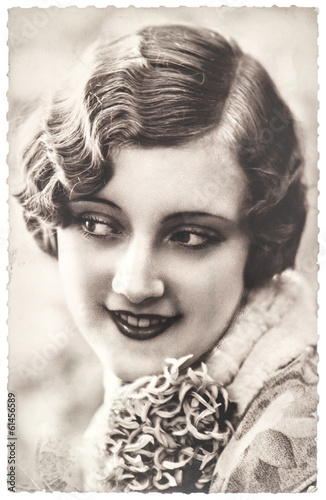 Naklejka na szafę vintage portrait of young woman with flowers