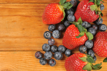 Wall Mural - Fresh blueberries and strawberries