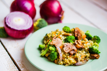 Wall Mural - Brown rice with vegetables(onions,mushrooms,broccoli) and tofu