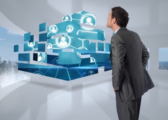 Aufkleber - Composite image of serious businessman with hands on hips