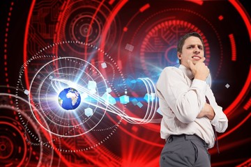 Poster - Composite image of thoughtful businessman with hand on chin