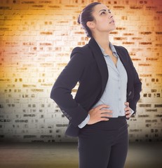 Poster - Composite image of serious businesswoman