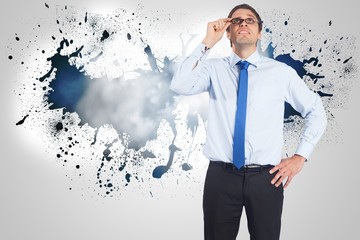 Poster - Composite image of thinking businessman tilting glasses
