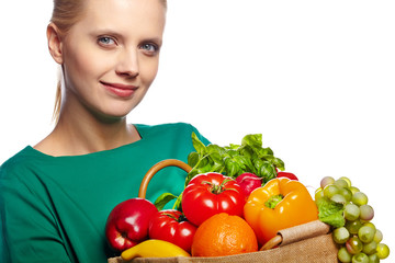 Young woman with a grocery shopping bag. Isolated on white backg